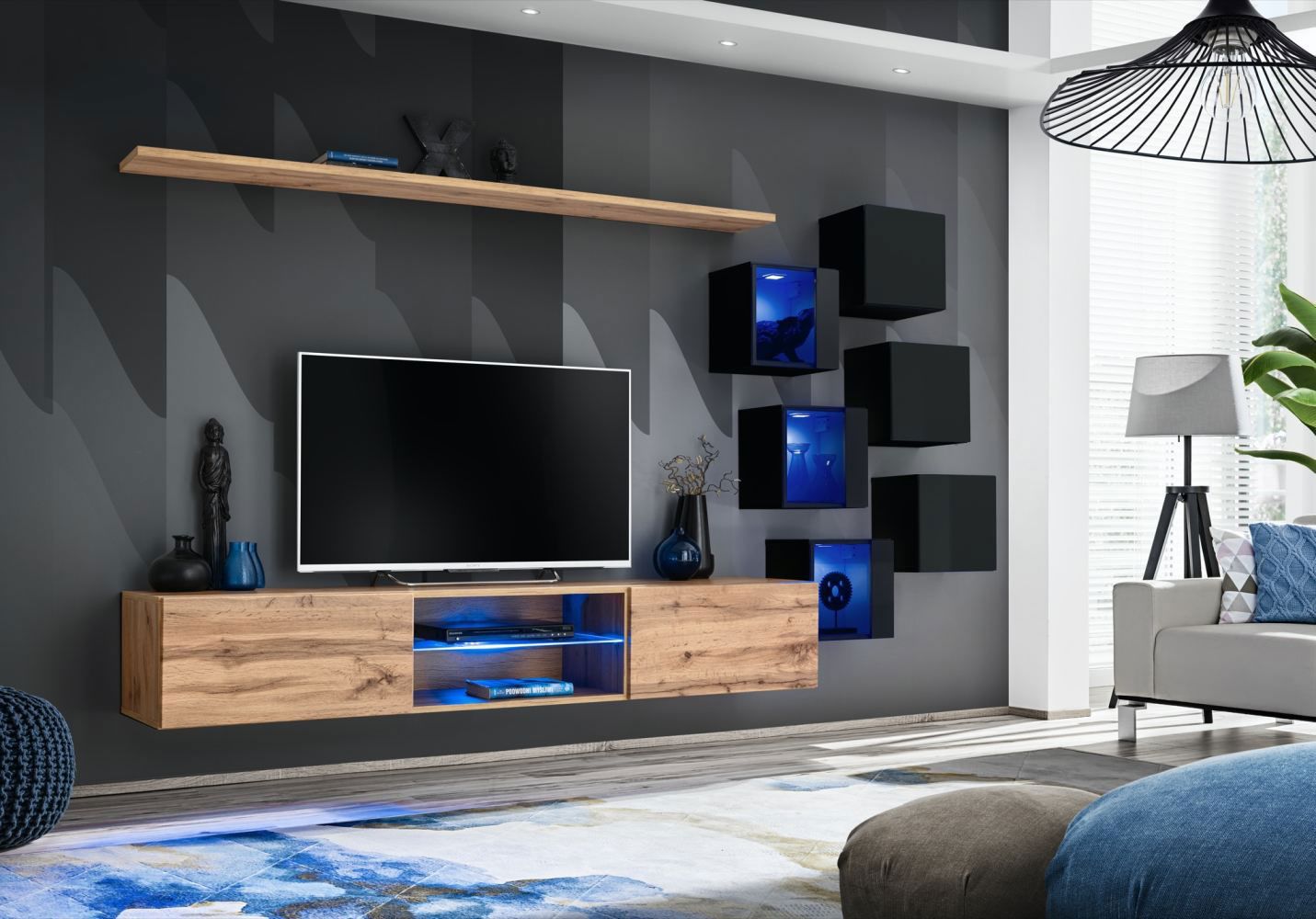 Mur de salon au design élégant Volleberg 13, Couleur : Chêne wotan / Noir - dimensions : 140 x 260 x 40 cm (h x l x p), avec éclairage LED bleu
